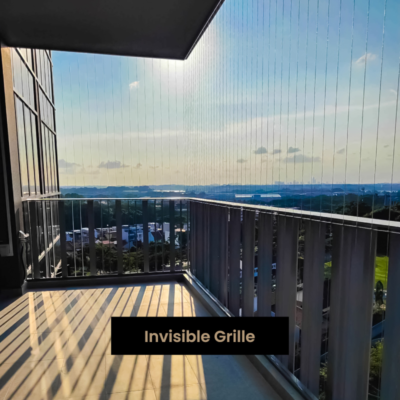 Invisible Grille installed on a high-rise balcony, providing discreet safety without blocking the view Invisible Grille installed on a high-rise balcony, providing discreet safety without blocking the view