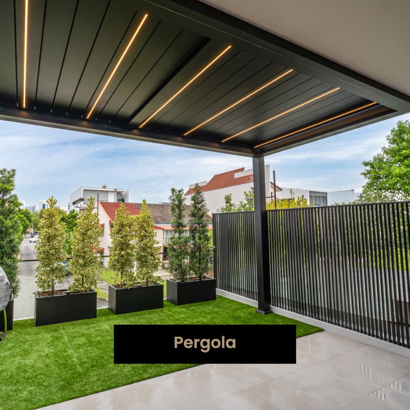 Modern pergola structure extending the outdoor living space of a home, creating a shaded patio area